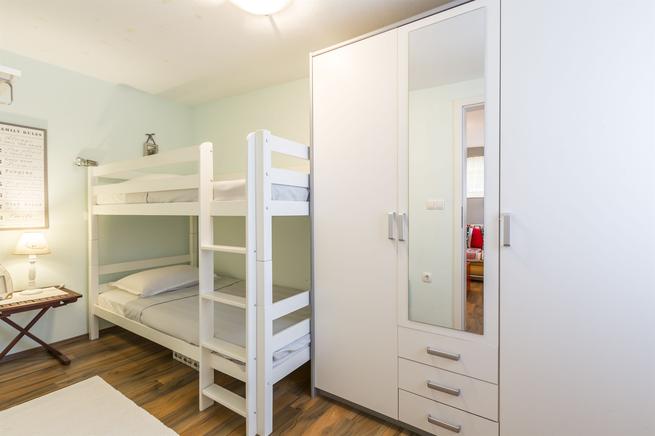 Schlafzimmer mit Etagenbett Schlafzimmer mit Etagenbett